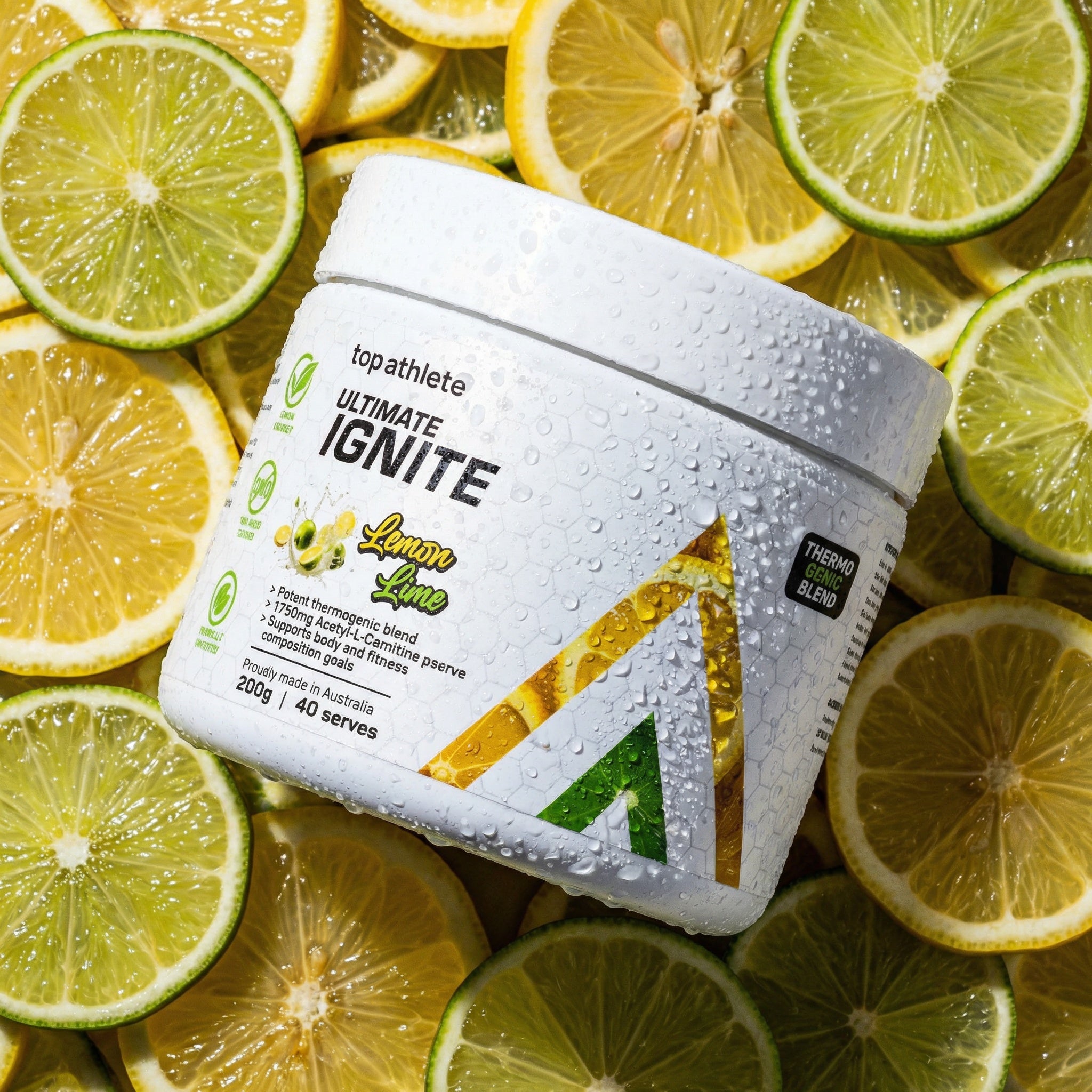 Topathlete Ultimate Ignite supplement container surrounded by lemon and lime slices