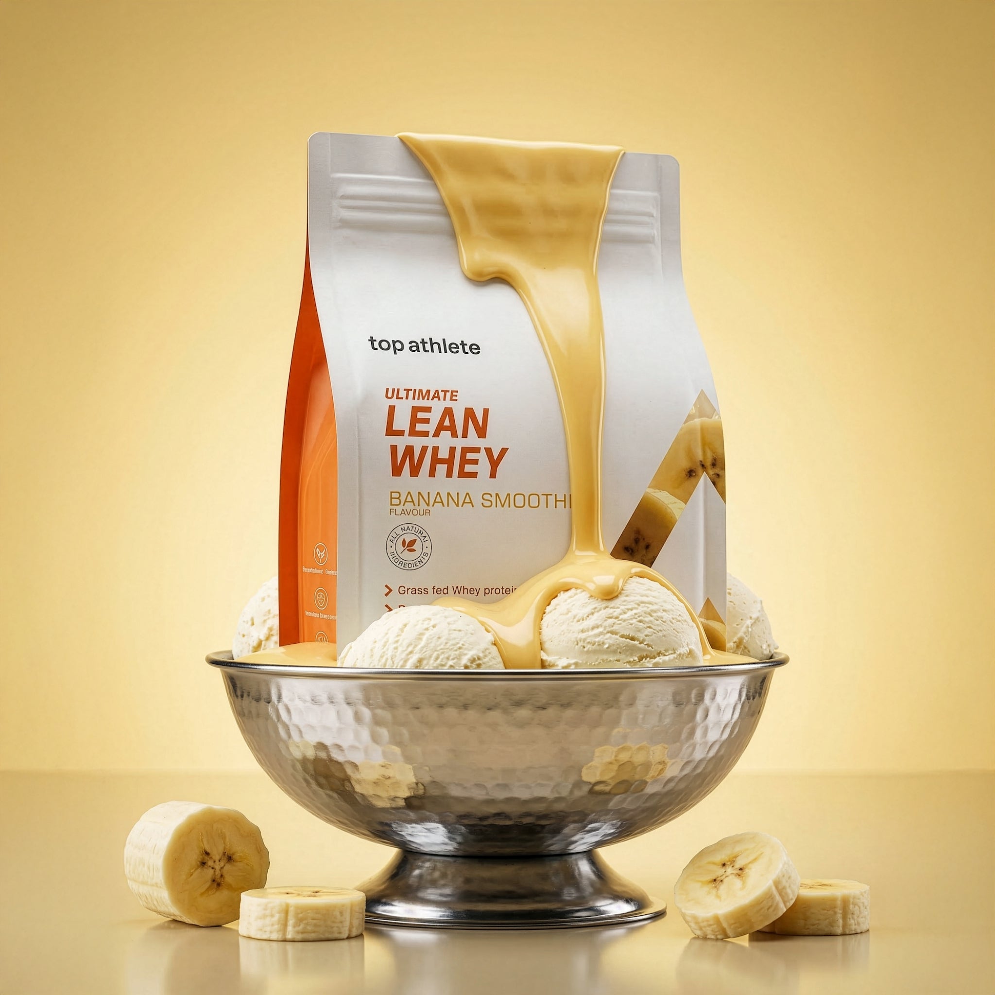 Top Athlete Lean Whey protein package with a bowl of ice cream and banana slices on a yellow background